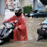 Bangkok roads submerged as flood disaster declared