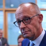 German Chancellor Merz calls state election a 'disaster' for his party but vows to stay on