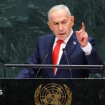 Netanyahu defends Israeli military action as delegates walk out before UN speech