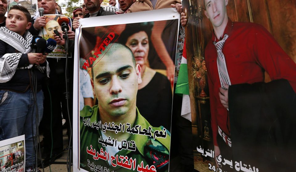 Israel’s president pardons soldier who killed wounded Palestinian in 2016