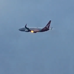 Flames burst from Qantas plane engine after New Zealand takeoff