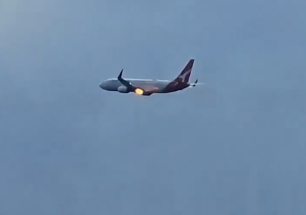 Flames burst from Qantas plane engine after New Zealand takeoff