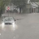 Flash flooding interrupts half-marathon, submerges cars