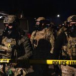 ICE agent charged with lying about shooting Venezuelan man during crackdown