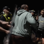 Anti-immigration protesters clash with police in UK after boat arrival