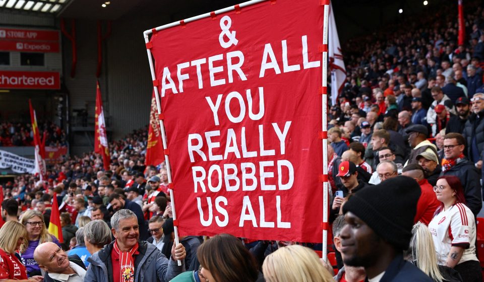 Which banners did Liverpool fans display at Anfield against Man City?