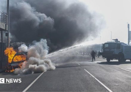 Cars torched and shops looted as anti-migrant violence erupts in South Africa