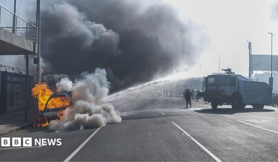 Cars torched and shops looted as anti-migrant violence erupts in South Africa