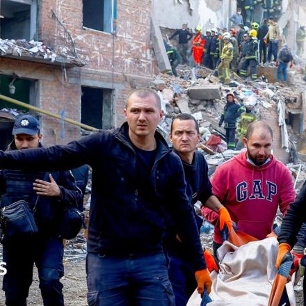 Children killed while they slept as Russian missile kills 19 in block of flats