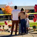 Oregon teacher fought school attacker before armed dad shot suspect 'multiple times'