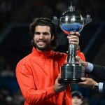 Djokovic wins China Open after de Minaur retires, Alcaraz wins Japan Open