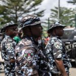 Gunmen kill at least 10 villagers and loot shops in north-east Nigeria