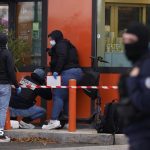 Deadly shooting near Paris is a 'racist terrorist attack', Macron says